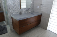 Thumb vanity  contemporary style  walnut  medium color  frameless construction  banded door  floating  off center sink