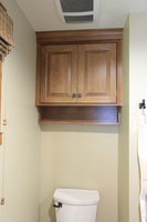 Thumb vanity  craftsman style  quartersawn oak  medium color  raised panel  toilet topper   13 crown  standard overlay