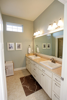 Thumb vanity  traditional style  painted  raised panel  double sinks  double sinks  banks of 3 drawers  standard overlay