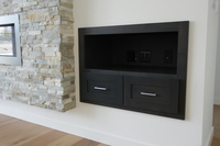 Thumb great room  contemporary style  clear alder  dark color  entertainment center  built in  slip in  fireplace area